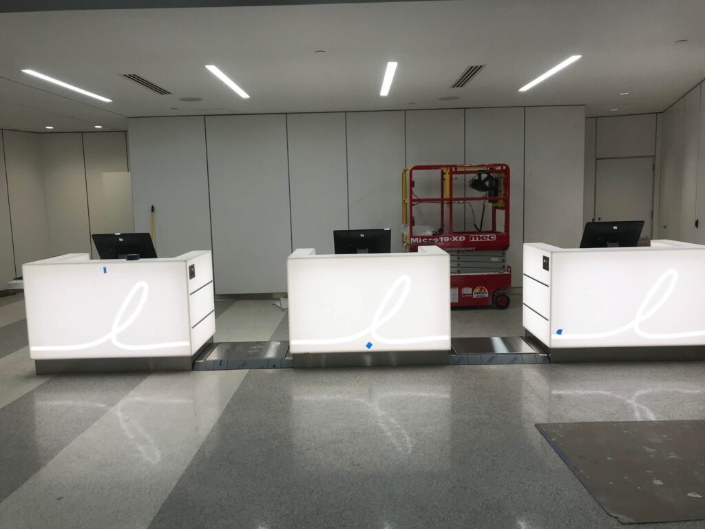 Airline check-in desks with in-floor baggage scales